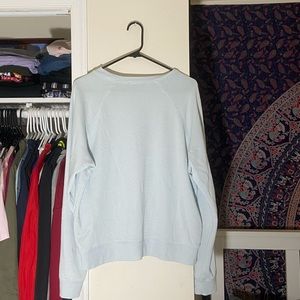 A blue light sweat shirt